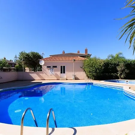 Adosado Con Jardin En Xalets De * Salou