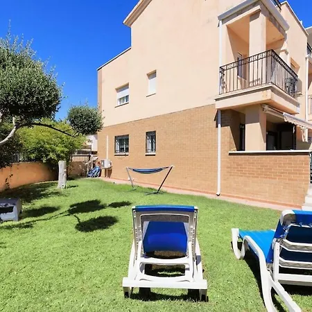 Holiday home Adosado Con Jardin En Xalets De *